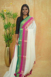 AWB7280 Off-White mul cotton saree features a plain body with golden zari and tassels.