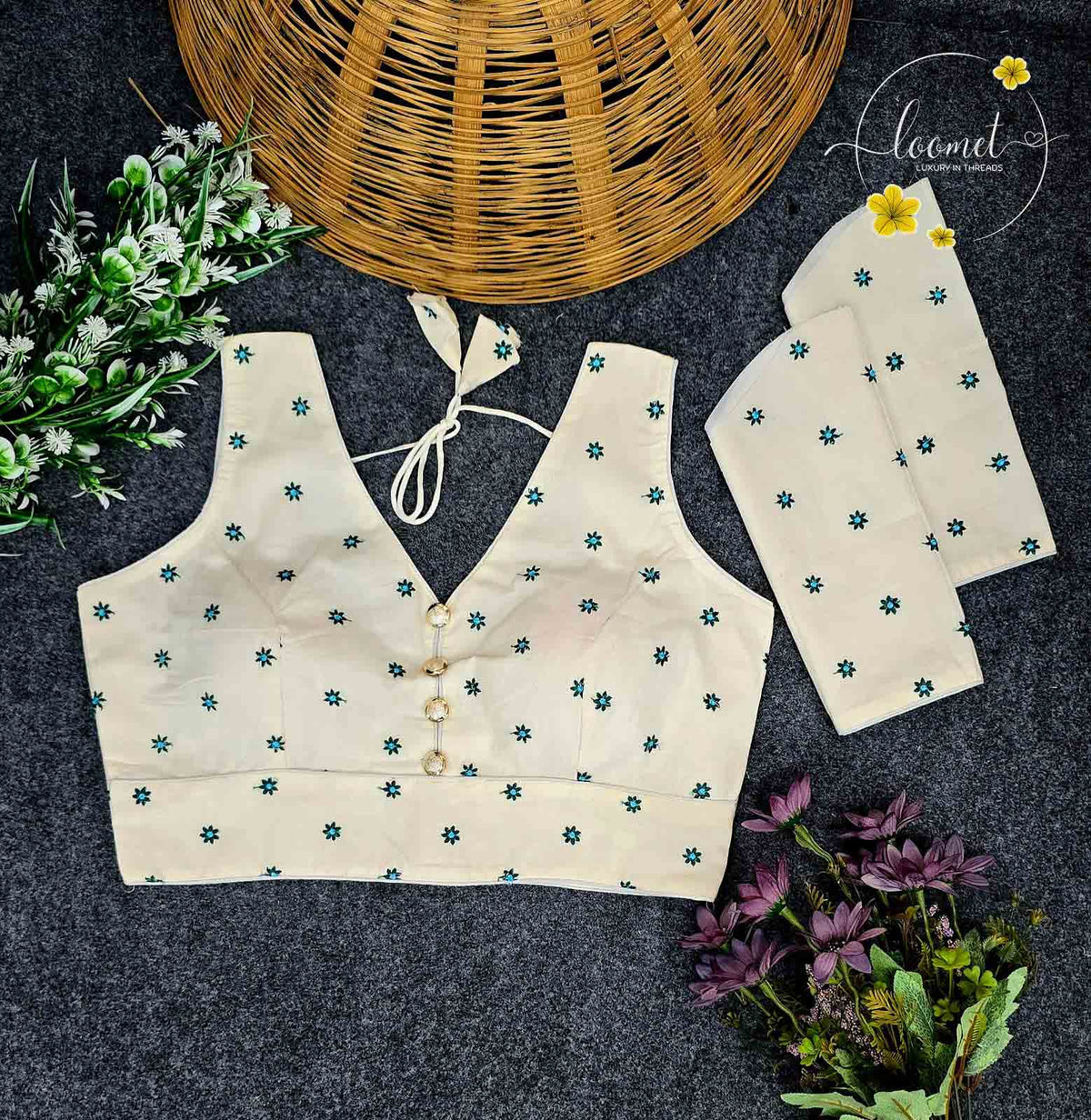 BLB1411 Off-white colour blouse features a delicate teal floral buttis pattern.