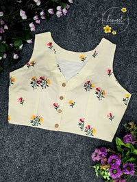 BLB1511 Off-white colour blouse features a delicate multi-color floral embroidery pattern.