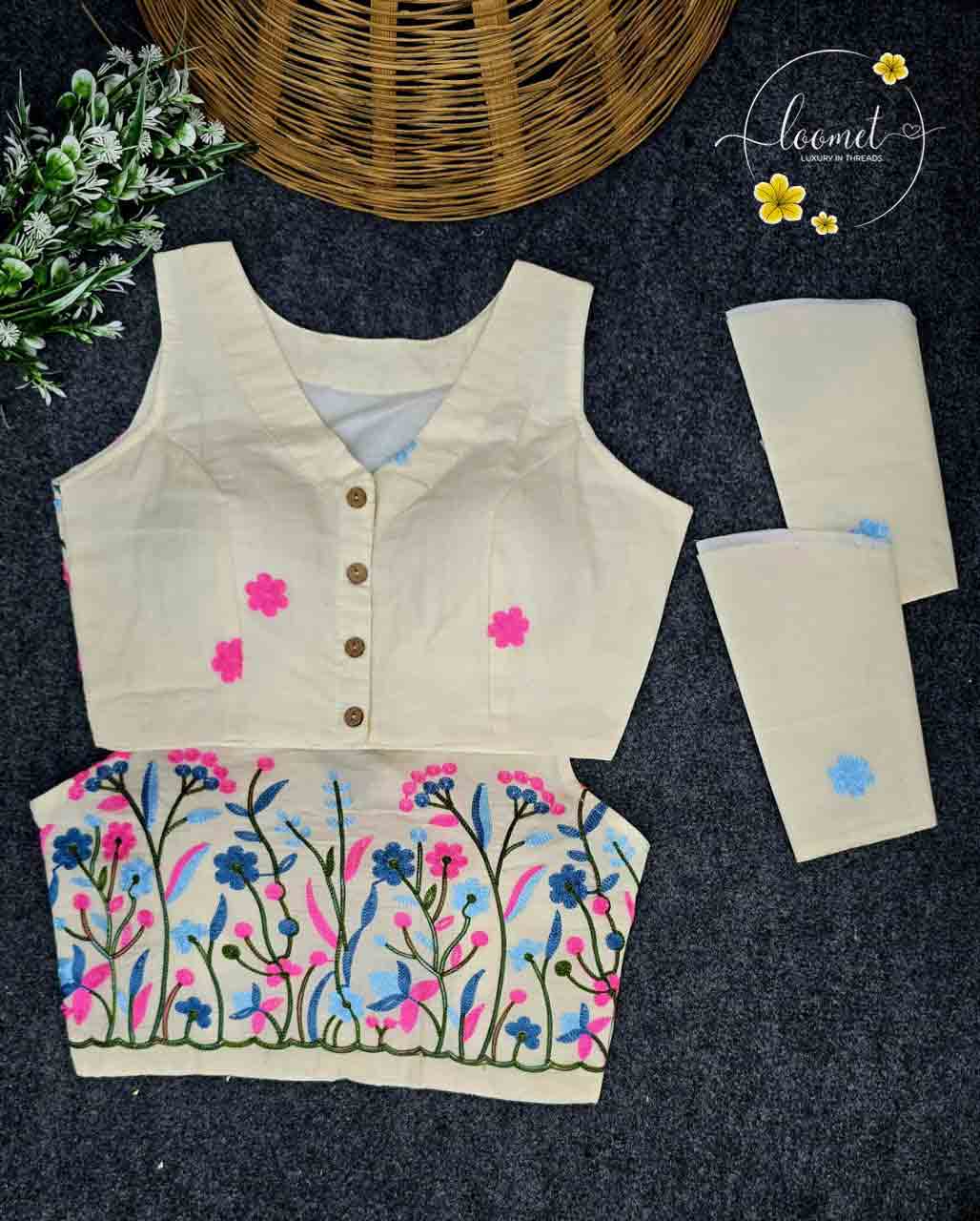 BLB1611 Off-white colour blouse features a delicate floral vine border in pink and blue embroidery pattern.