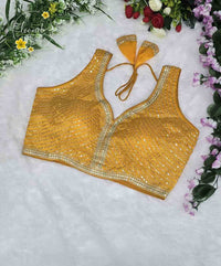 BLB2113 Mustard yellow colour fendy silk embroidery blouse.