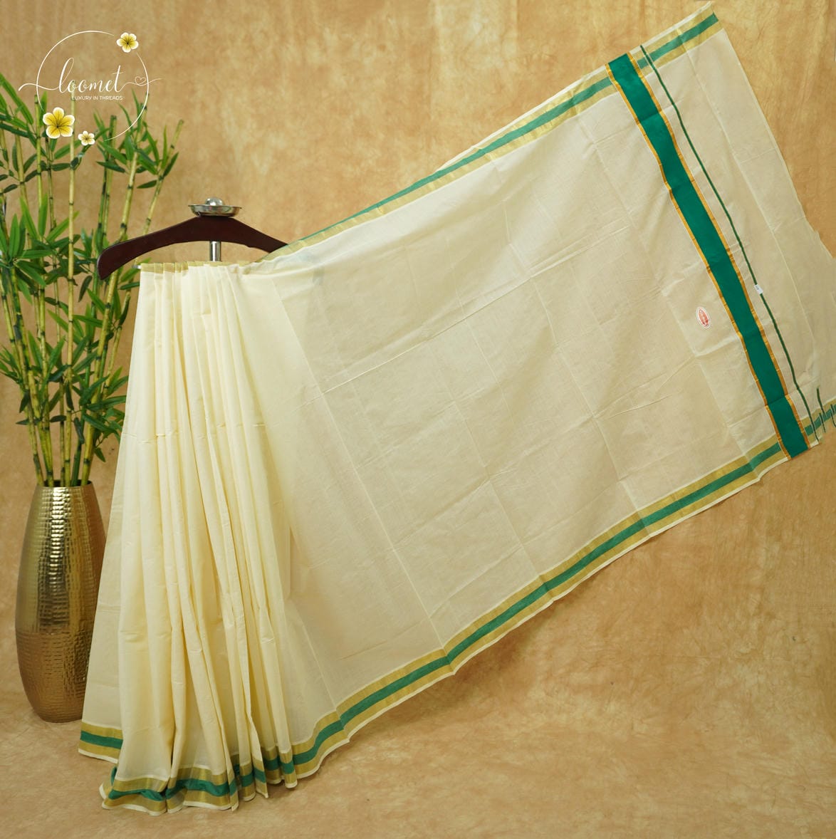 CKS5211 Off-White Cotton saree with emerald green and gold zari border.