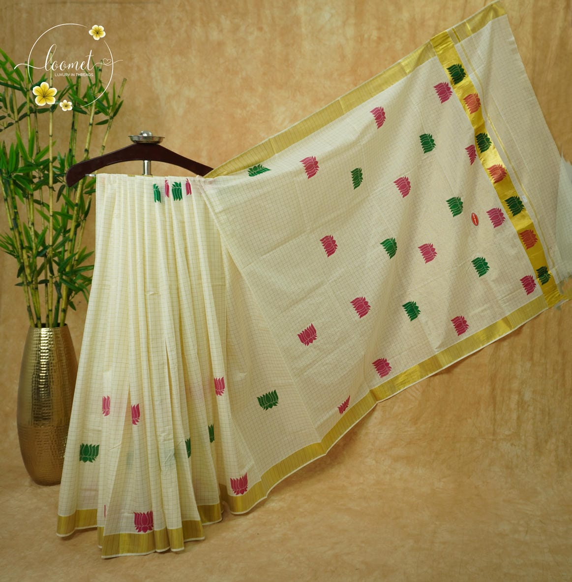 CKS5811 Off-White Cotton saree with multi-colour lotus motifs and gold zari check pattern.