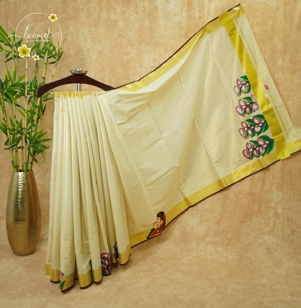 CKS6011 Off-White Tissue Cotton saree featuring mauve calla lily blossoms with gold zari border.