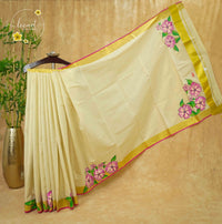 CKS6021 Light Gold Tissue Cotton saree featuring hand-painted hibiscus floral.