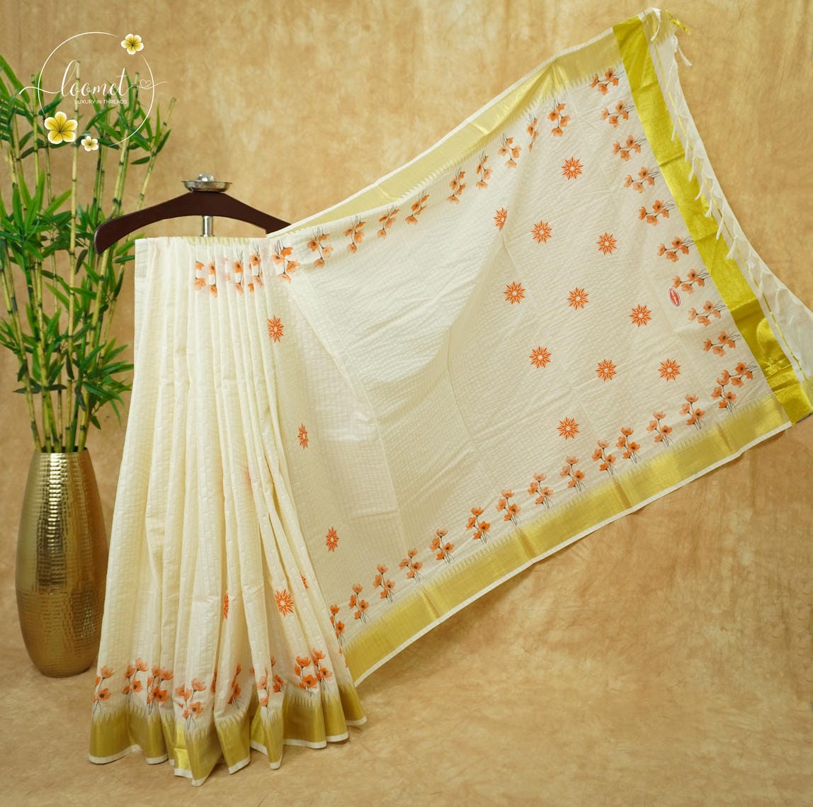 CKS6061 Off-White Cotton saree featuring wildflower prints in an orange with temple-edge gold border.