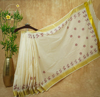 CKS6062 Off-White Cotton saree featuring wildflower prints in an dusty rose with temple-edge gold border.