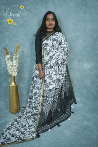 ICS1221 Black & White Linen-Cotton saree featuring floral and vine (bel) print.