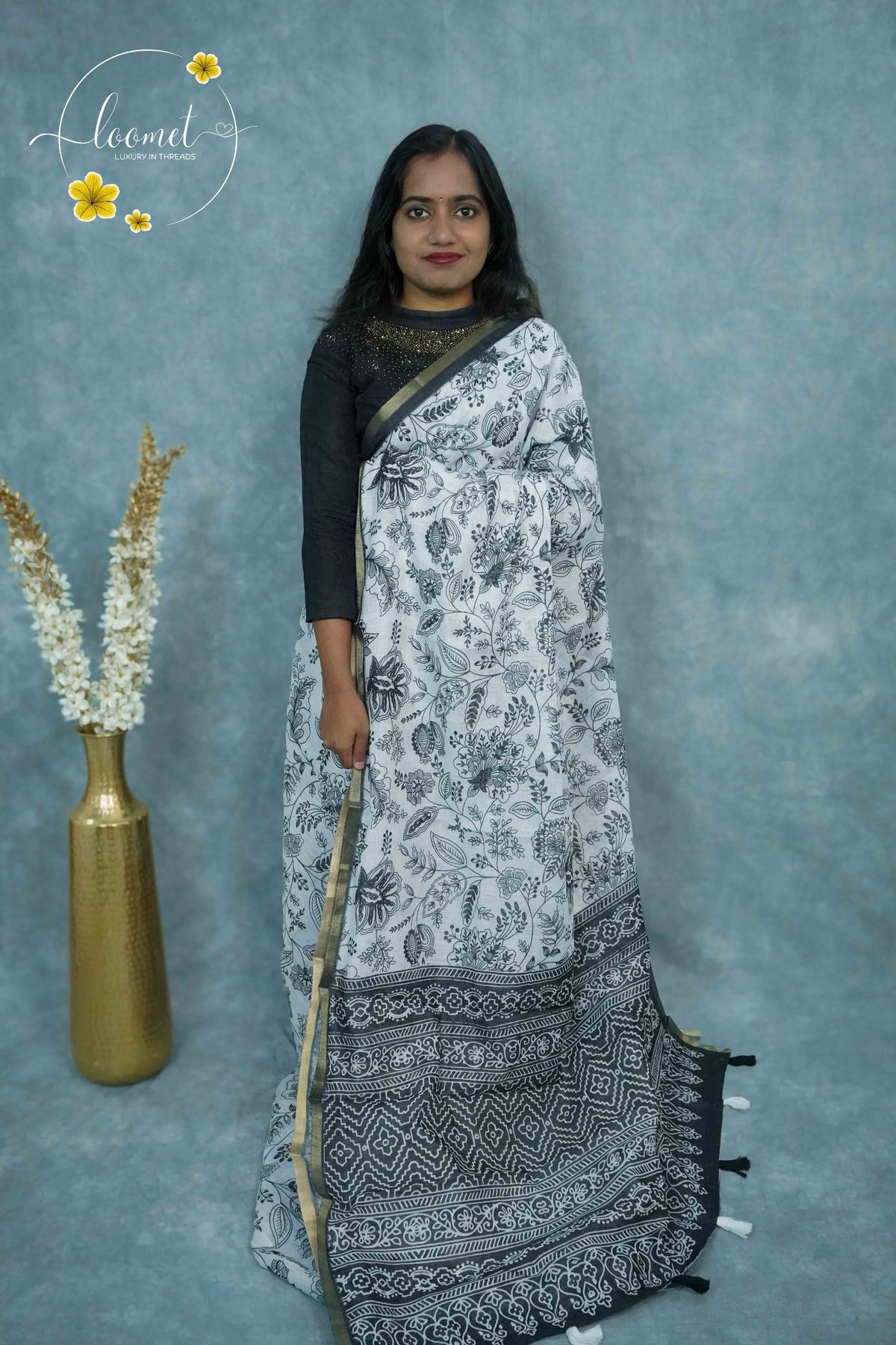 ICS1223 Black & White Linen-Cotton saree featuring floral & leafy vine print.