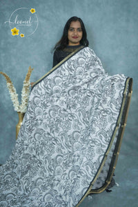 ICS1225 Black & White Linen-Cotton saree featuring floral and vine (bel) print.