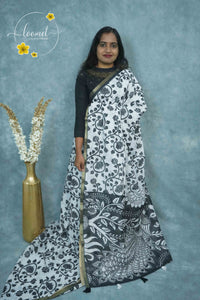 ICS1226 Black & White Linen-Cotton saree featuring lotus and vine (bel) print.