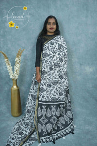 ICS1227 Black & White Linen-Cotton saree featuring paisley and floral vine print.