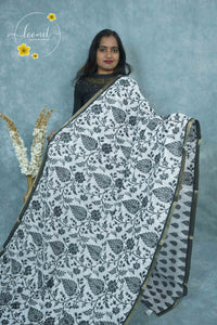 ICS1227 Black & White Linen-Cotton saree featuring paisley and floral vine print.