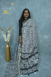ICS1228 Black & White Linen-Cotton saree featuring swirling floral & foliage print.