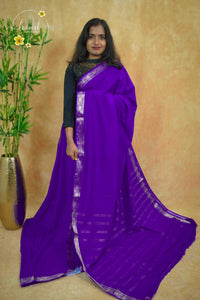 IMC5114 Electric Purple Georgette Viscose saree with horizontal gold zari stripes.