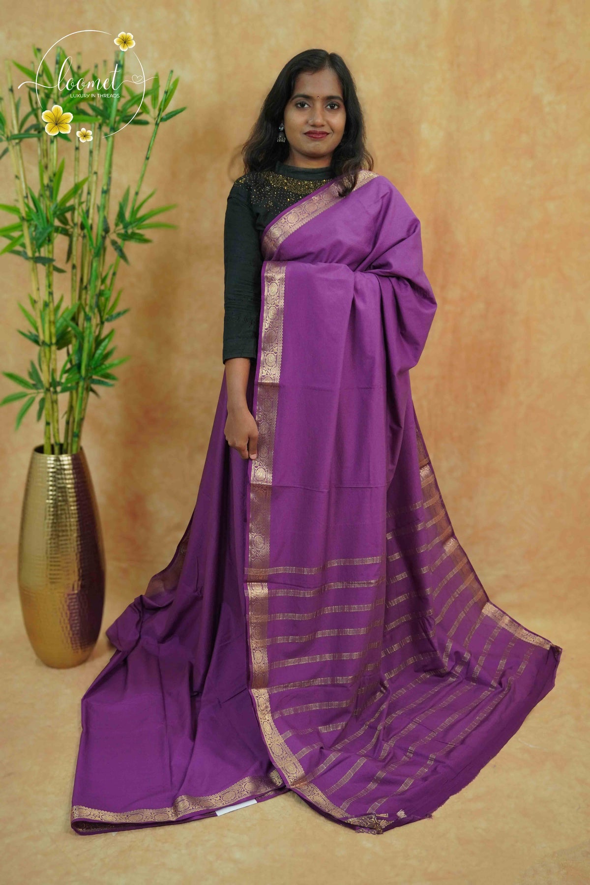 IMC5117 Rich Plum Georgette Viscose saree with horizontal gold zari stripes.