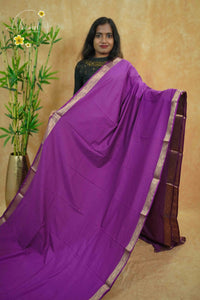 IMC5117 Rich Plum Georgette Viscose saree with horizontal gold zari stripes.