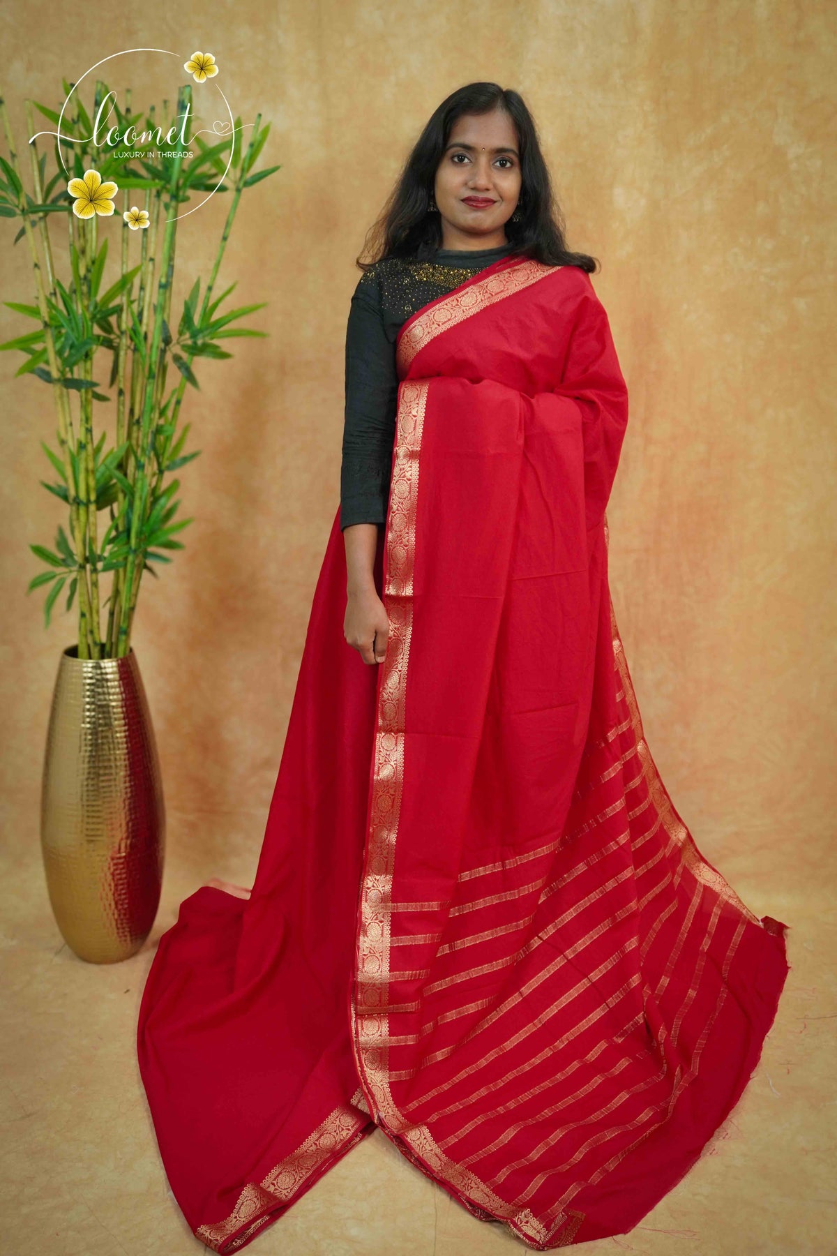 IMC5120 Red Georgette Viscose saree with horizontal gold zari stripes.
