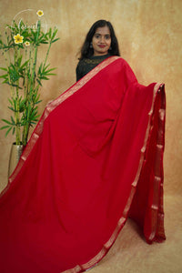 IMC5120 Red Georgette Viscose saree with horizontal gold zari stripes.