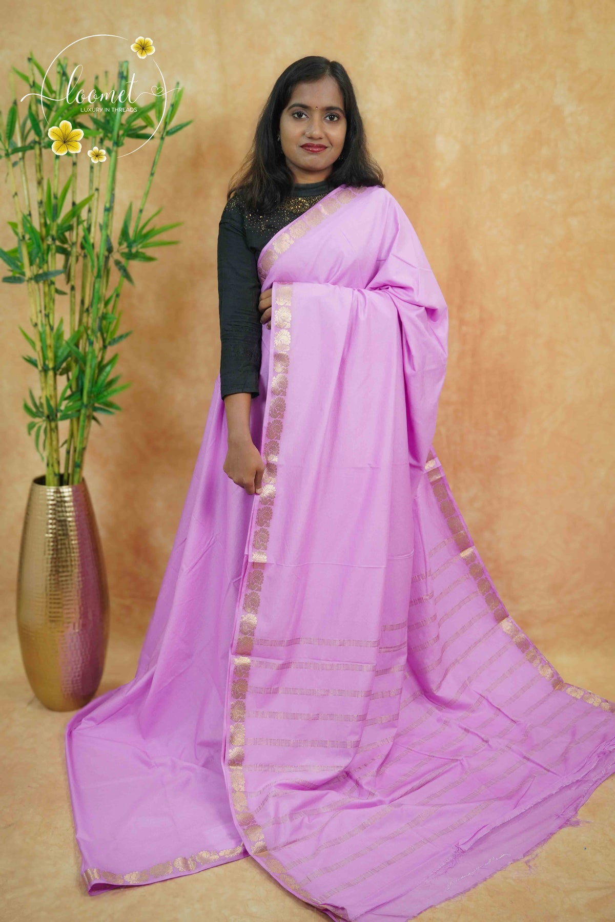 IMC7112 Pastel Lilac Georgette viscose saree with annapakshi motif and Gold Zari stripes