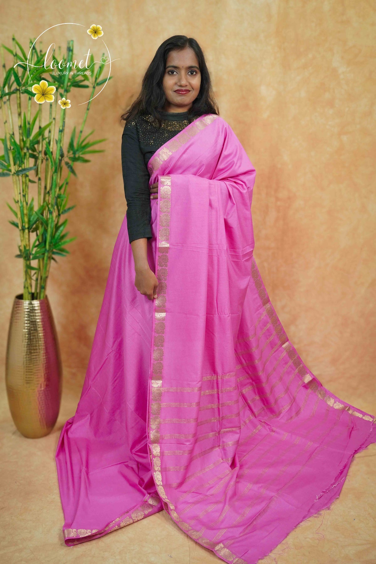 IMC7113 Candy Pink Georgette viscose saree with annapakshi motif and Gold Zari stripes.