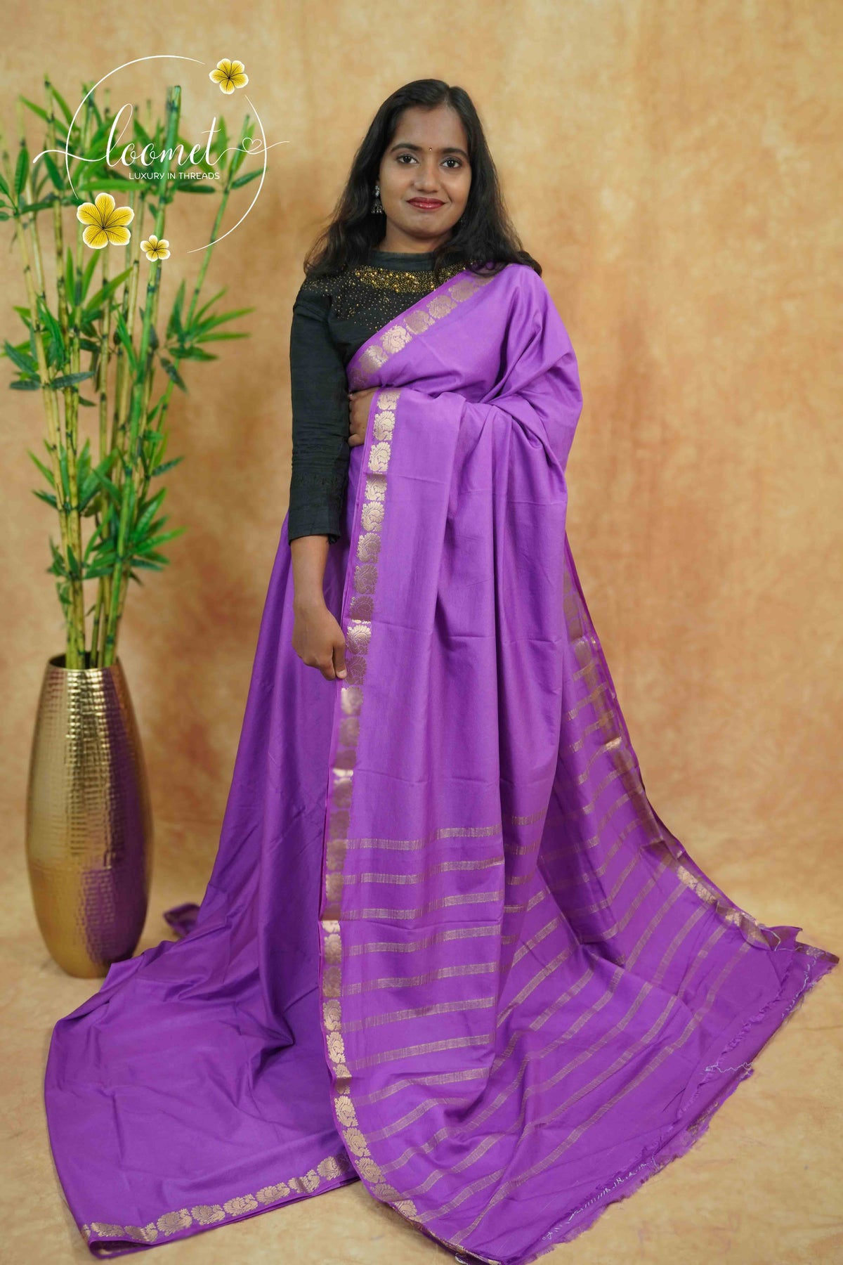 IMC7114 Royal Purple Georgette viscose saree with annapakshi motif and Gold Zari stripes.
