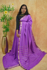 IMC7114 Royal Purple Georgette viscose saree with annapakshi motif and Gold Zari stripes.