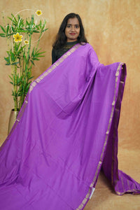 IMC7114 Royal Purple Georgette viscose saree with annapakshi motif and Gold Zari stripes.