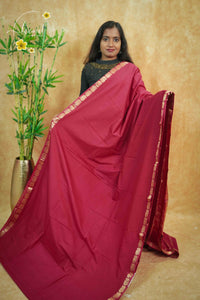 IMC7115 Maroon Georgette viscose saree with annapakshi motif and Gold Zari stripes.