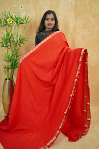 IMC7116 Red Georgette viscose saree with annapakshi motif and Gold Zari stripes.