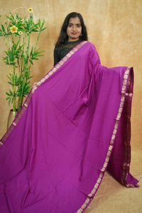 IMC7117 Magenta Georgette viscose saree with annapakshi motif and Gold Zari stripes.