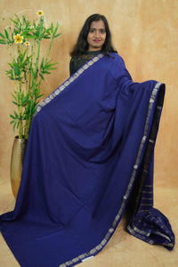 IMC7118 Royal Blue Georgette viscose saree with annapakshi motif and Gold Zari stripes.