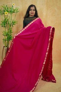 IMC7119 Rani Pink Georgette viscose saree with annapakshi motif and Gold Zari stripes.