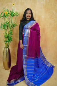 IS6111 Plum and Royal Blue Georgette Viscose saree with floral gold zari border.