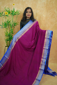 IS6111 Plum and Royal Blue Georgette Viscose saree with floral gold zari border.
