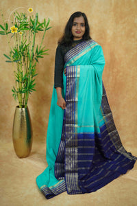 IS6113 Seafoam Blue and Navy-Blue Georgette Viscose sareewith floral gold zari border.