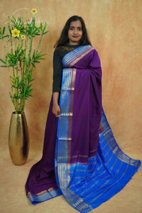 IS6114 Purple and Cerulean Blue Georgette Viscose saree with floral gold zari border.
