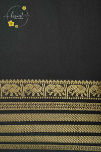 IS6117 Parrot Green and Jet-Black Georgette Viscose saree with floral gold zari border.