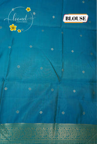 ISS8311 Off-White and turquoise blue Banarasi Semi Cotton saree with floral motifs.