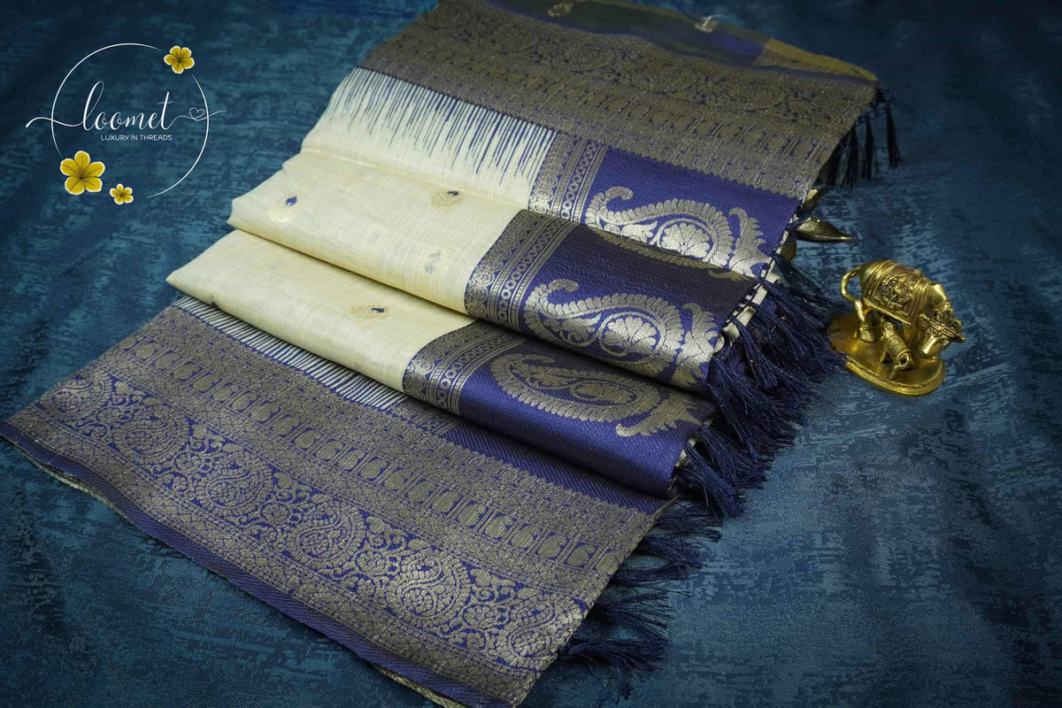 ISS8316 Off-White and royal indigo blue Banarasi Semi Cotton saree with floral motifs.