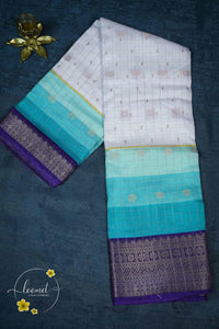ISS8337 White and Aqua-to-Teal Semi Organza Silk with small zari buttas and checkered pattern.