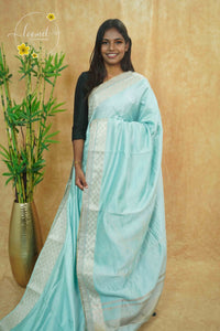 IWS4331 Sky Blue semi tussar silk saree with a silver checked zari border.