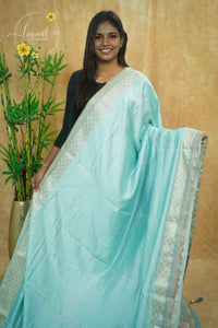 IWS4331 Sky Blue semi tussar silk saree with a silver checked zari border.