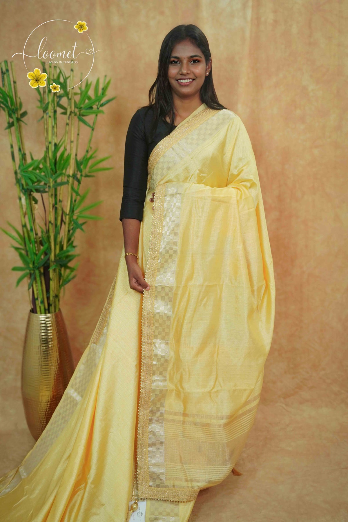 IWS4332 Lemon yellow Semi Tussar Silk saree with a silver checked zari border.