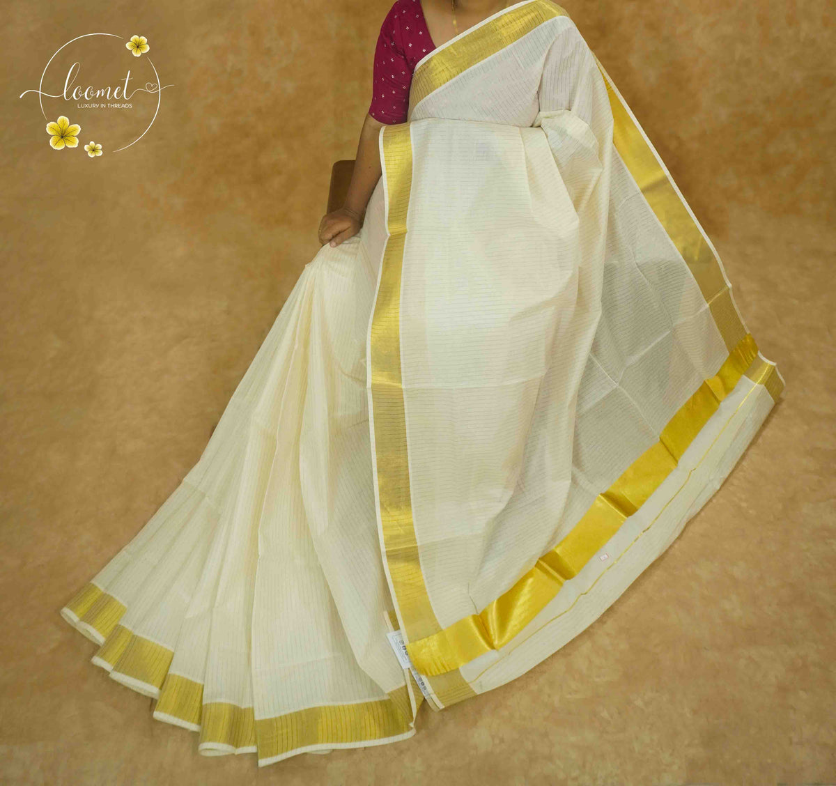 KAS2811 Off-White Kerala Cotton saree with subtle zari pinstripes and bold golden kasavu border.