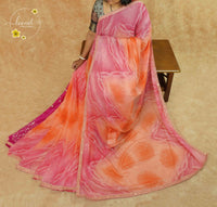 KST6144 Candy Pink & Coral Orange Georgette saree with Marble-Effect Tie-Dye.