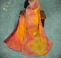 KST6145 Orange and Yellow Georgette saree with Marble-Effect Tie-Dye and Sequin embroidery.