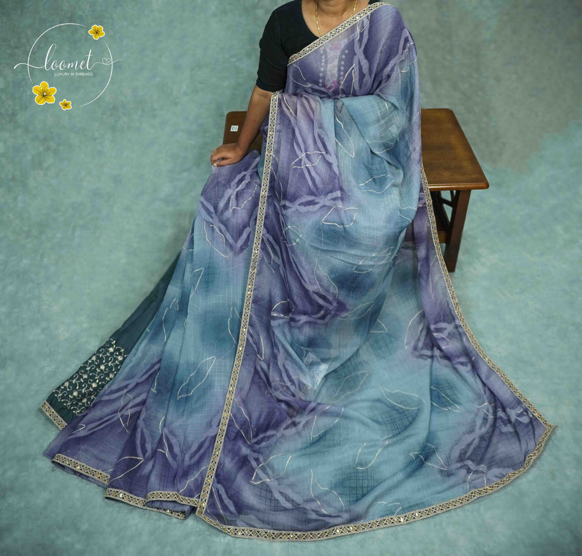 KST6148 Blue and Purple Georgette saree with Marble-Effect Tie-Dye and Sequin embroidery.