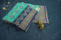 KST7131 Seafoam green Pochampalli Silk-Cotton saree featuring ikat-style buttas.