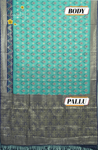 KST7131 Seafoam green Pochampalli Silk-Cotton saree featuring ikat-style buttas.